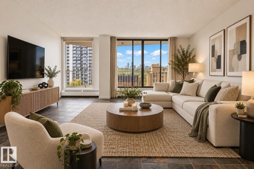 Hard surface flooring, large windows, and a built-in media console VIRTUAL STAGING - #702 10045 117 St Nw, Edmonton, AB 