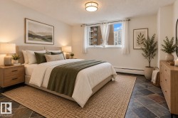 Recessed lighting, window with white sheer drapery, dark slate-style flooring, light wood-finish nightstands, and a light wood-finish dresser VIRTUAL STAGING - 