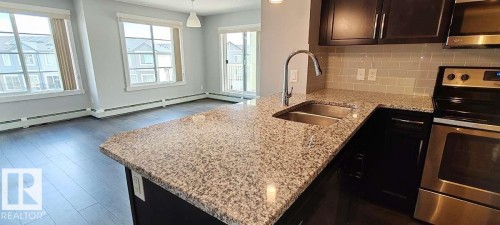 #302 3670 139 Av Nw, Edmonton, AB - Indoor Photo Showing Kitchen With Double Sink