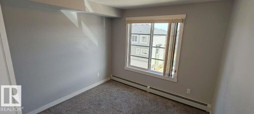 #302 3670 139 Av Nw, Edmonton, AB - Indoor Photo Showing Other Room