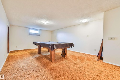 Wall-to-wall carpeting in a rich hue - 9 Hawkins Crescent, Sherwood Park, AB 