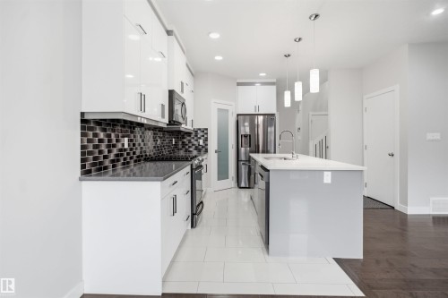 #46 1703 16 Av Nw, Edmonton, AB - Indoor Photo Showing Kitchen With Upgraded Kitchen