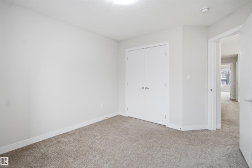 #46 1703 16 Av Nw, Edmonton, AB - Indoor Photo Showing Other Room