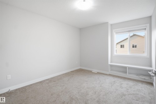 #46 1703 16 Av Nw, Edmonton, AB - Indoor Photo Showing Other Room