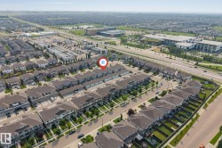 Aerial perspective showcasing a residential development with structured street layouts - 