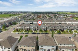 Aerial perspective of a developed residential neighborhood with a variety of multi-family homes - 