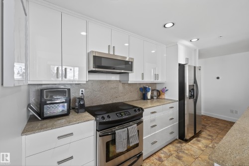 #701 10028 119 St Nw, Edmonton, AB - Indoor Photo Showing Kitchen With Stainless Steel Kitchen With Upgraded Kitchen