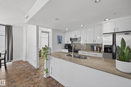 #701 10028 119 St Nw, Edmonton, AB - Indoor Photo Showing Kitchen With Double Sink With Upgraded Kitchen