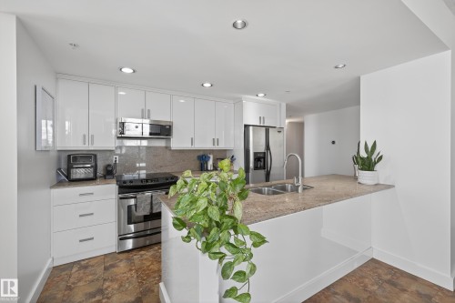 #701 10028 119 St Nw, Edmonton, AB - Indoor Photo Showing Kitchen With Double Sink With Upgraded Kitchen