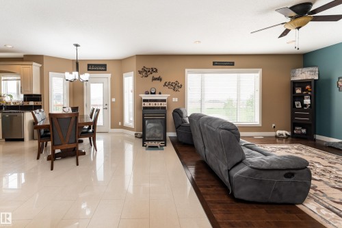 107 Mcdowell Wynd, Leduc, AB - Indoor With Fireplace