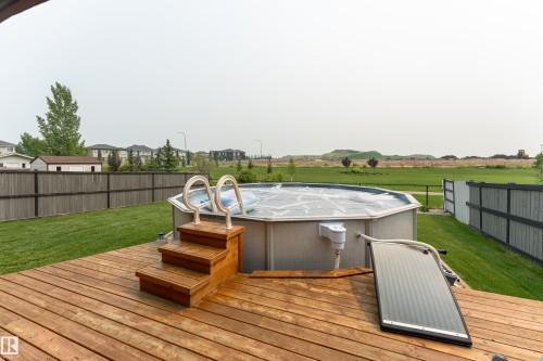 107 Mcdowell Wynd, Leduc, AB - Outdoor With Above Ground Pool With Deck Patio Veranda