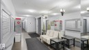 Mailbox wall with individual units, recessed lighting, and tiled flooring - #107 10153 117 St Nw, Edmonton, AB 