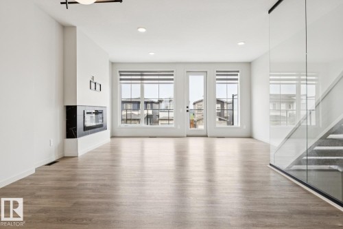 3290 Kulay Way Sw, Edmonton, AB - Indoor With Fireplace