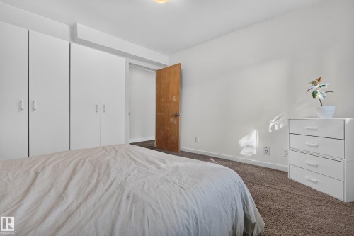 Built-in wardrobes with white panel doors - 11603 72 Avenue Nw, Edmonton, AB 