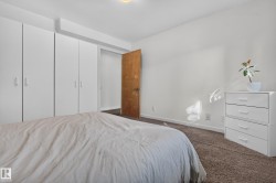 Built-in wardrobes with white panel doors - 
