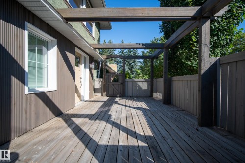Wood deck with an overhead pergola structure - 11603 72 Avenue Nw, Edmonton, AB 