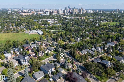 Aerial perspective of a verdant neighborhood with a distant cityscape - 11603 72 Avenue Nw, Edmonton, AB 