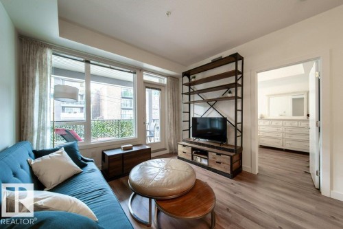 #207 9907 91 Av Nw, Edmonton, AB - Indoor Photo Showing Living Room