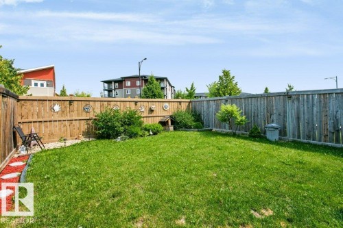 Expansive green lawn with a privacy fence - 3496 Weidle Way Sw, Edmonton, AB - Outdoor