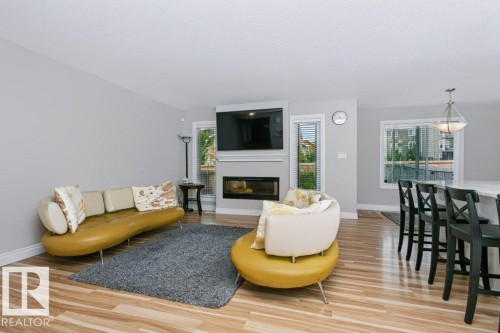 3496 Weidle Way Sw, Edmonton, AB - Indoor Photo Showing Living Room With Fireplace