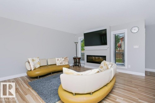 3496 Weidle Way Sw, Edmonton, AB - Indoor Photo Showing Living Room With Fireplace