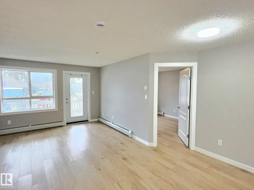 #103 5350 199 St Nw, Edmonton, AB - Indoor Photo Showing Other Room