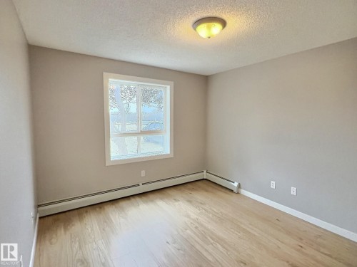 #103 5350 199 St Nw, Edmonton, AB - Indoor Photo Showing Other Room