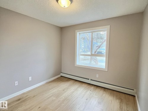 #103 5350 199 St Nw, Edmonton, AB - Indoor Photo Showing Other Room