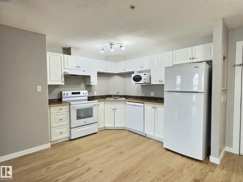 #103 5350 199 St Nw, Edmonton, AB - Indoor Photo Showing Kitchen