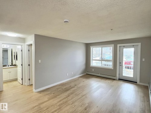 #103 5350 199 St Nw, Edmonton, AB - Indoor Photo Showing Other Room