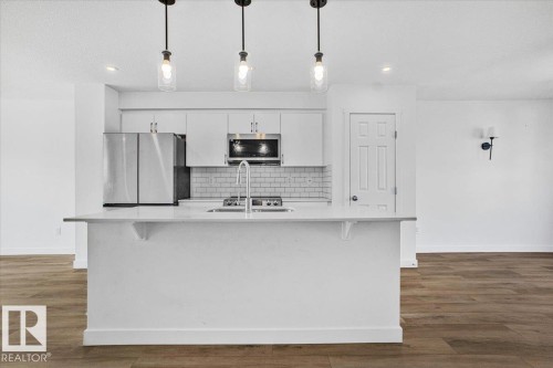 12 Elliot Wynd, Fort Saskatchewan, AB - Indoor Photo Showing Kitchen With Upgraded Kitchen