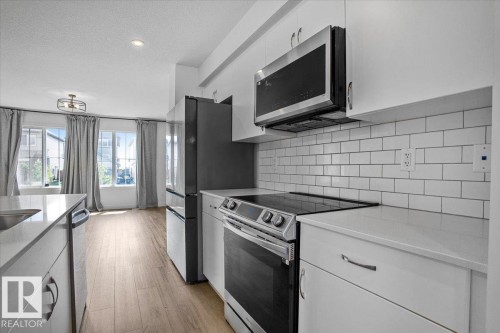 12 Elliot Wynd, Fort Saskatchewan, AB - Indoor Photo Showing Kitchen