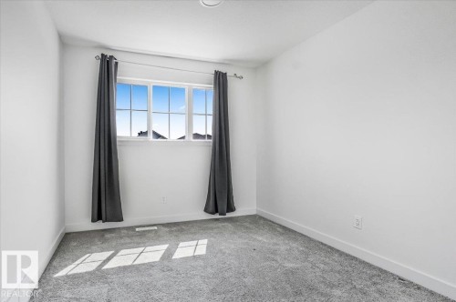 12 Elliot Wynd, Fort Saskatchewan, AB - Indoor Photo Showing Other Room