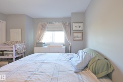 Window with blinds and drapes, light gray wall paint, and white trim - 
