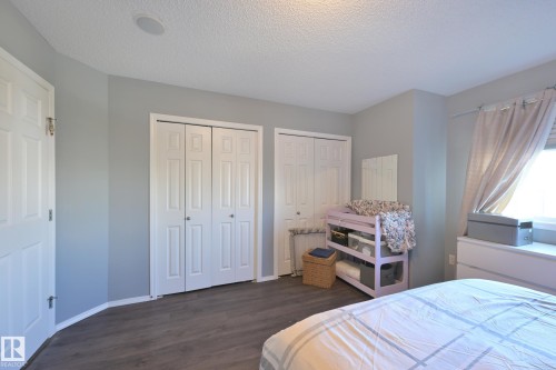 Wood-finish flooring - 8127 7 Avenue Sw, Edmonton, AB 