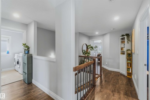 Wood-finish flooring throughout the hallway - 7 Etoile Cres, St. Albert, AB 