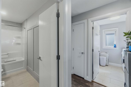 White paneled doors with sleek hardware - 7 Etoile Cres, St. Albert, AB 
