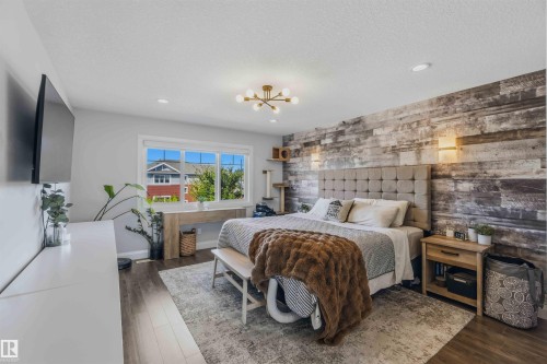 Accent wall with wood-finish paneling - 7 Etoile Cres, St. Albert, AB 