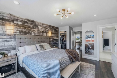 Wood-finish accent wall with integrated sconces - 7 Etoile Cres, St. Albert, AB 
