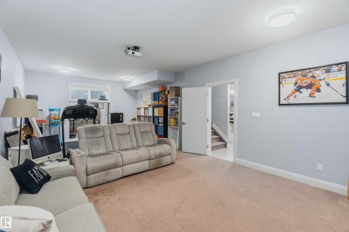 Recessed ceiling lighting, white baseboard trim, and a white interior door - 7 Etoile Cres, St. Albert, AB 