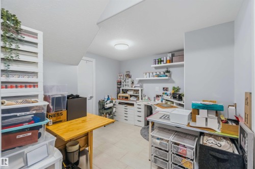 Recessed ceiling lighting, light-toned wall paint, and light-toned tile flooring - 7 Etoile Cres, St. Albert, AB 