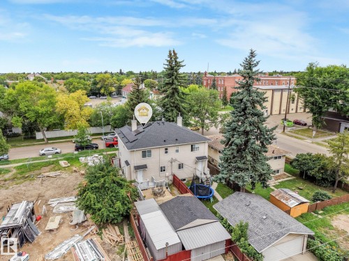 Two-story property with a dark shingle roof and solar panels - 12843 67 Street Nw, Edmonton, AB 
