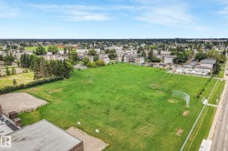 Expansive green spaces and mature landscaping - 