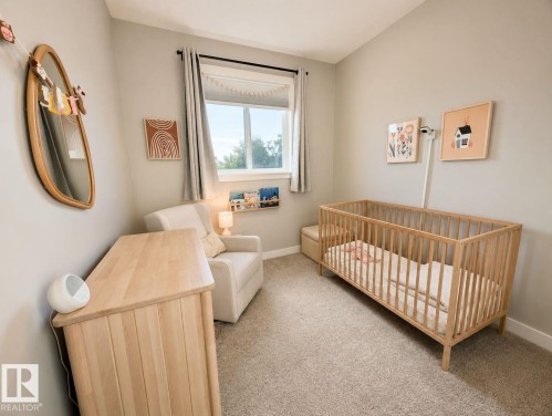 Carpeted room with a window, light gray walls, and recessed lighting - 10516 76 Street Nw, Edmonton, AB 