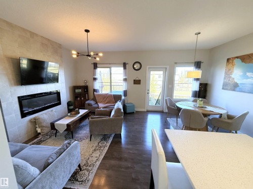 98 Greenbury Close, Spruce Grove, AB - Indoor Photo Showing Living Room With Fireplace
