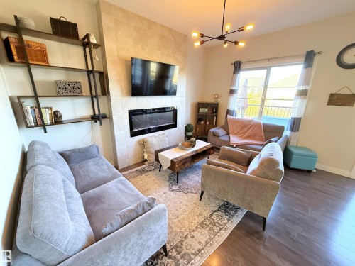98 Greenbury Close, Spruce Grove, AB - Indoor Photo Showing Living Room With Fireplace