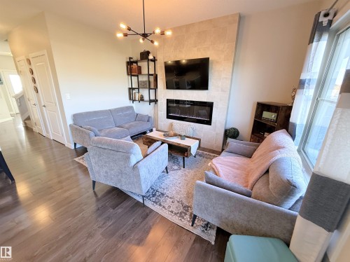 98 Greenbury Close, Spruce Grove, AB - Indoor Photo Showing Living Room With Fireplace