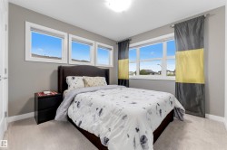 Neutral wall color, carpet flooring, multiple windows, recessed lighting - 