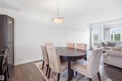 Recessed lighting, wood-finish flooring, and multiple windows - 