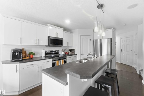 7 Catalina Court, Fort Saskatchewan, AB - Indoor Photo Showing Kitchen With Stainless Steel Kitchen With Double Sink